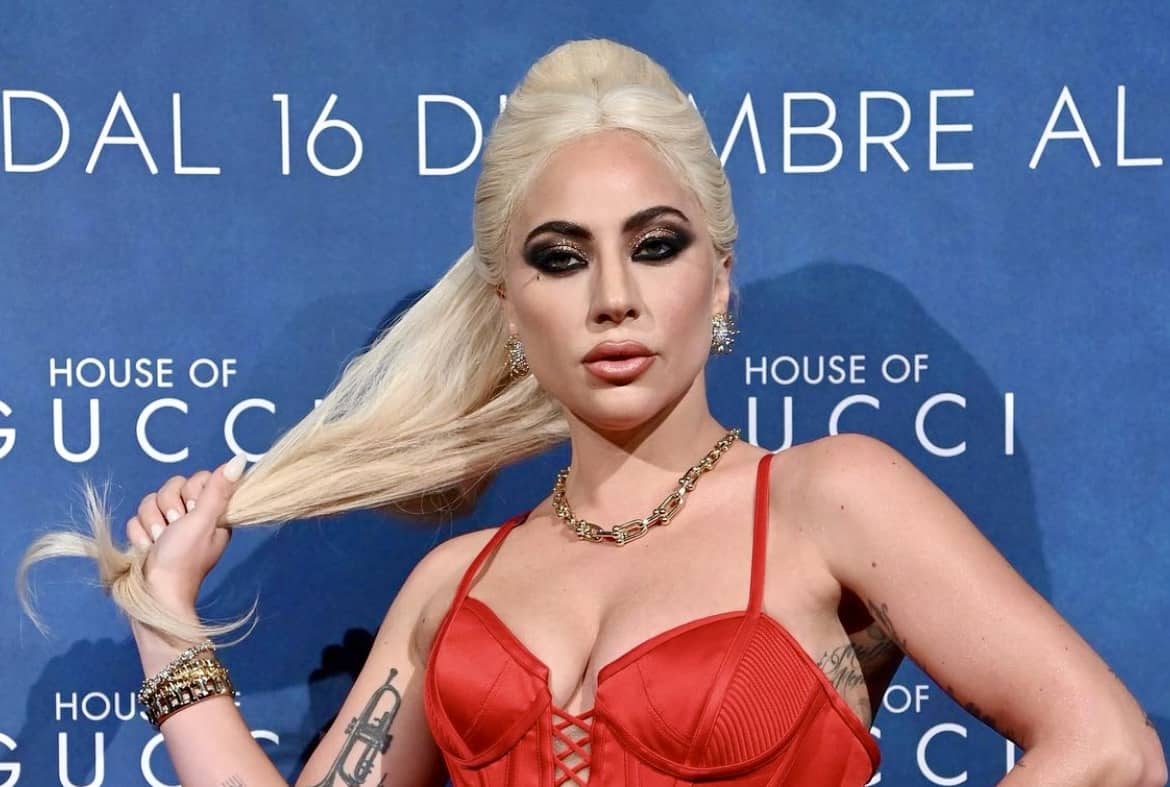 Lady Gaga wears stunning “Haus of Versace” gown to House of Gucci premiere