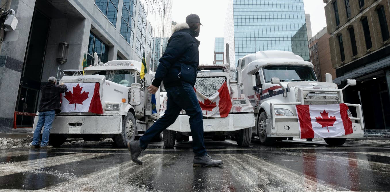 Parliament Ottawa trucker freedom convoy protest photos